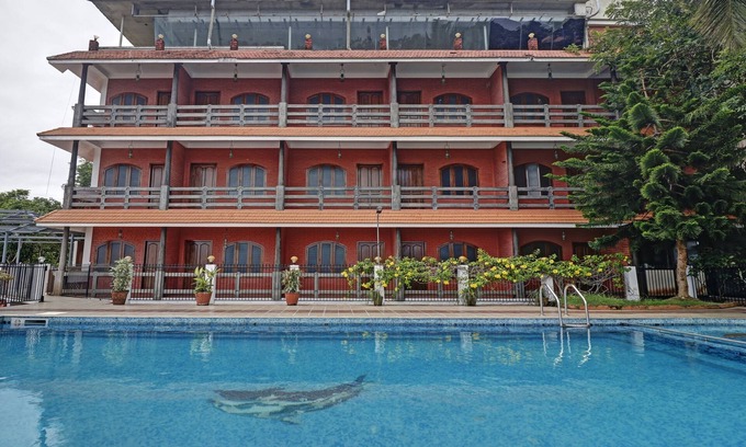 Kovalam Hotel | Treebo Trend Green Palm Resorts