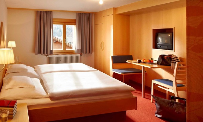 Bizau House | Triple room with half board - Hotel Wirtshaus Taube