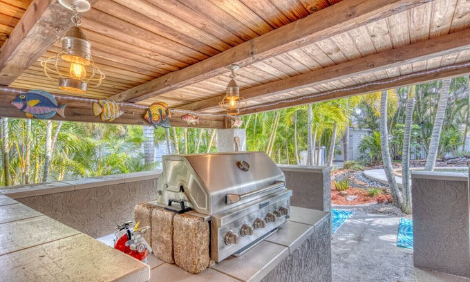 Whitney Beach House | Tropical Retreat Near AMI & IMG | Outdoor Kitchen
