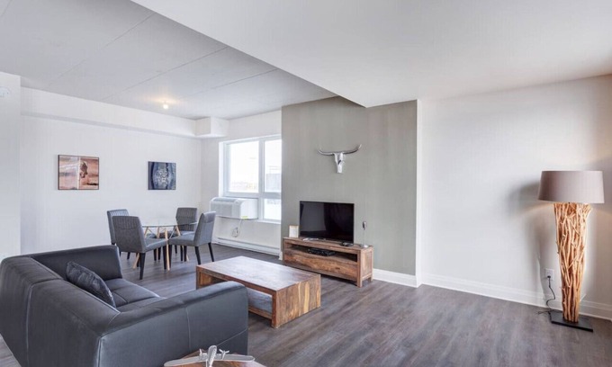 Laval Apartment | Urban 2BR Escape In-suite Laundry and Terrace
