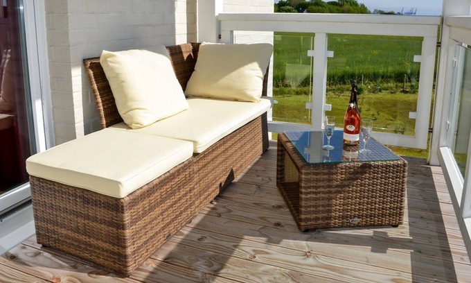 Wremen Apartment | Vacation apartment near the beach with sauna and great, covered balcony with dyke view