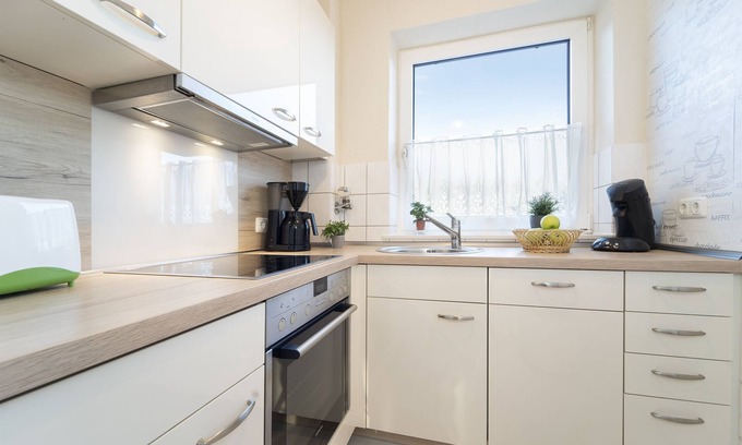 Lutt Kiepenbarg Apartment | Vacation apartment Kleiner Strandpirat in the apartment complex Wennseestraße