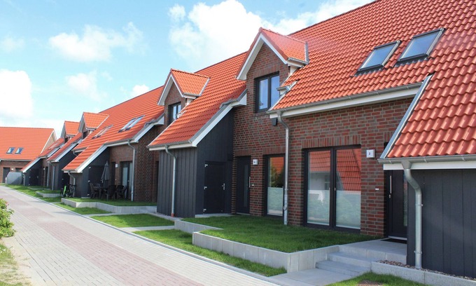 Wremen Apartment | Vacation terraced house Spiekeroog. Family-friendly and elegant.