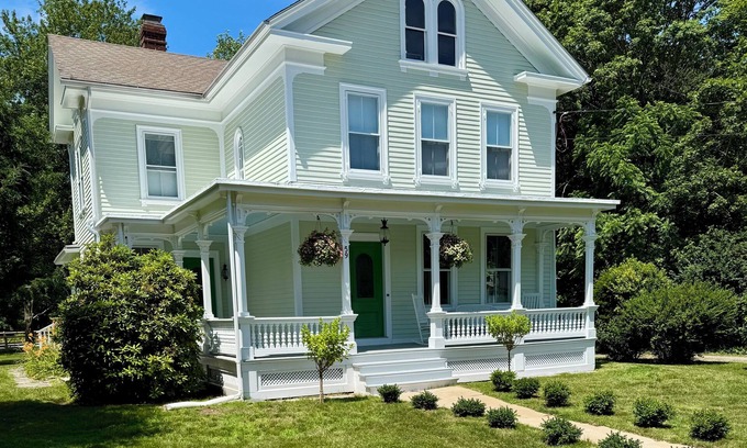 Westbrook Center House | Victorian beach house and cottage family compound with large pool in Westbrook