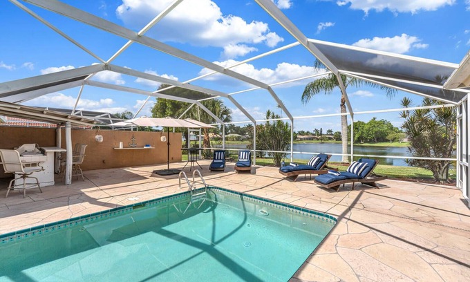 Central Naples Villa | Villa Bellevue - Beautiful lakefront rental with pool with 3 bedroom & 2 bath
