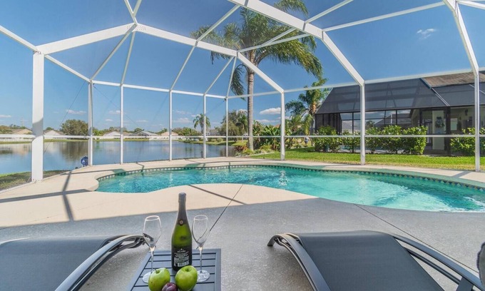 Sabal Harbour House | Villa Madeira -Stylish Pool Abode with Lake Views by Gulfcoast Holiday Homes