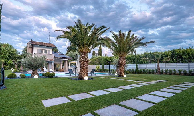 San Benedetto di Lugana Villa | Villa "Sirmione Lakefront" with Lake View, Private Heated Pool and Wi-Fi