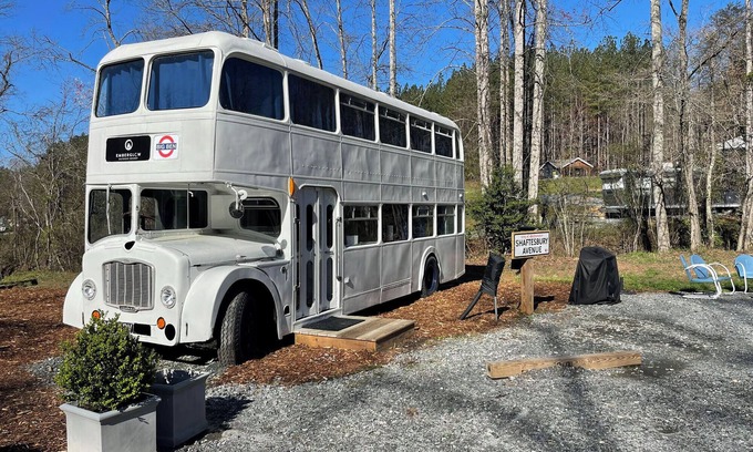 Mill Spring Apartment | Vintage 1962 double decker bus on the creek, gas grill, fire pit, short walk to pool and playground, sleeps 4-5.