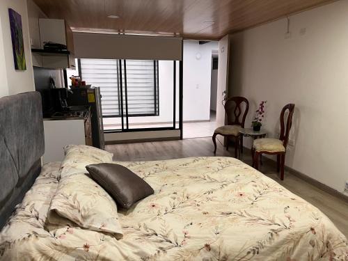 Barrios Unidos Apartment | W living 103