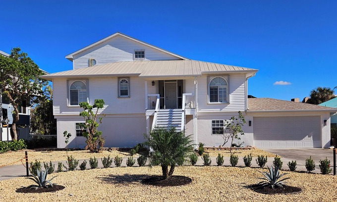 Laguna Shores House | WALK TO BEACH, PRIVATE FAMILY AND PET FRIENDLY POOL HOME ON A CANAL