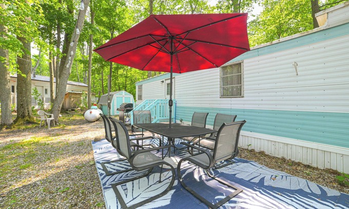 Kalkaska House | Walk to Manistee Lake: Retro Cottage w/Fire Pit!