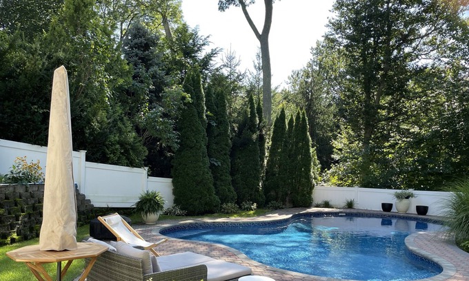 Riverhead House | Walk to the beach or swim in the pool