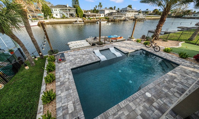 Spring Hill House | Waterfront home w/direct gulf access + pool + hot tub + activites!