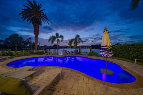Indian Rocks Beach House | Waterfront Luxury w/Heated Salt Pool & Golf Cart