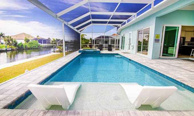 Pelican House | Waterside, Heated Saltwater Pool and Spa with Modern, Florida charm.