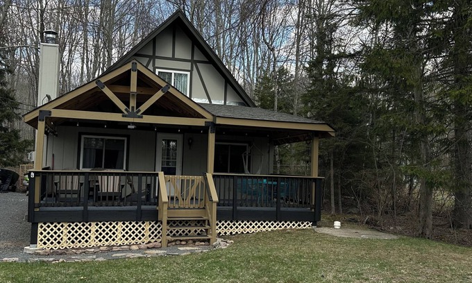 Pocono Lake Ski Chalet | Waterview, air conditioning, adjacent to the beach, covered front and rear decks