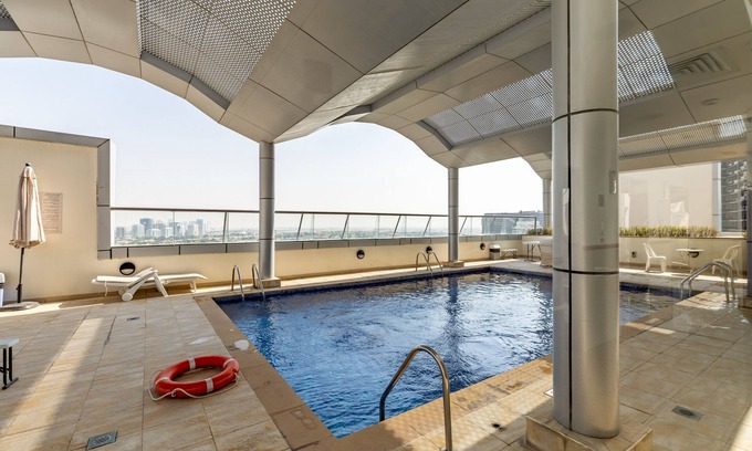 Dubai Sports City Apartment | Waves - Cozy, Fully Furnished Studio in Dubai Sports City