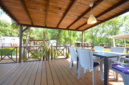 Lanterna Resort | West Coast Mobilhome with XXL Terrace in Naturist Resort Solaris FKK