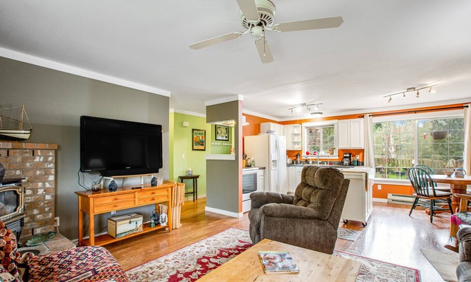 Langley House | Whidbey Retreat with firepit, fenced yard, al fresco dining, & WiFi