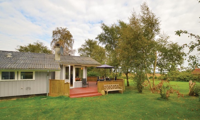 Bog By House | With a view of Bogø and Grønsund lies this beautiful cottage.