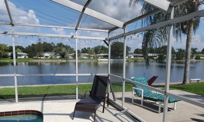 Jasmine Lakes House | WOW Waterfront Heated Pool Home by BEACH Sleeps 12