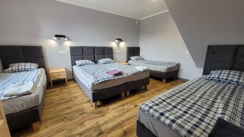 Checiny Apartment | Wrzosowe Wzgórze 5 - Apartamenty