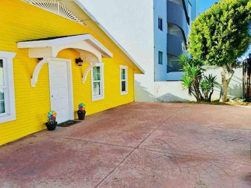 Villas de Rosarito House | Yellow Beachfront Dream Home