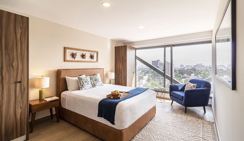 One bedroom penthouse with balcony and city view