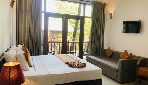 Deluxe Triple Balcony side seaview