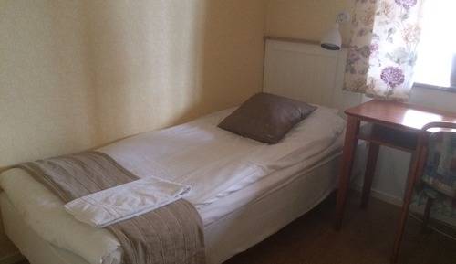 Single Room, Shared Bathroom