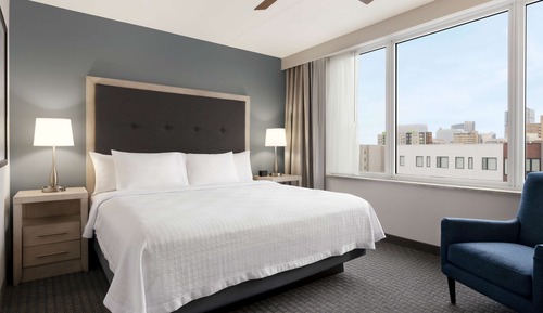 One Bedroom Suite, One King and One Sofa Bed, Roll In Shower