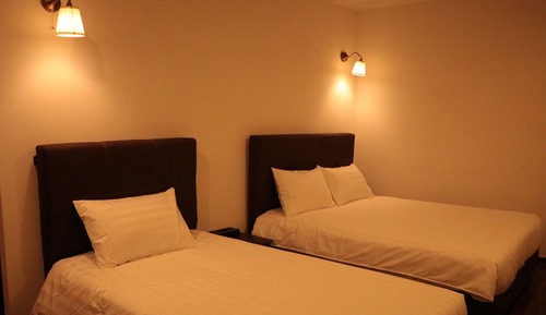 Deluxe Triplet Room