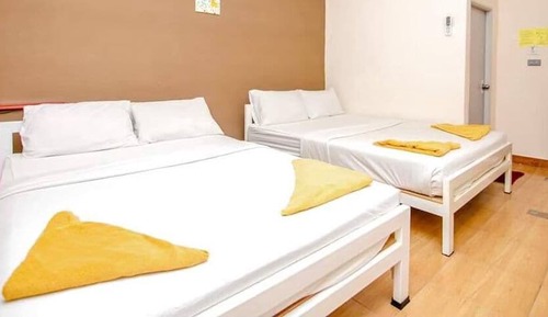 Exclusive Quadruple Room, 2 Queen Beds, Garden View