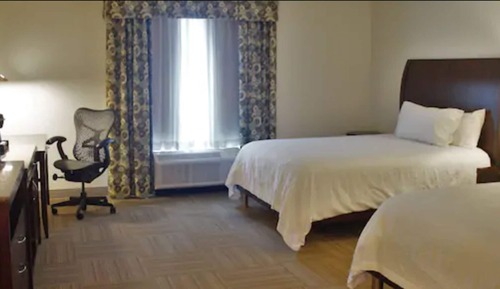 Two queen beds evolution room
