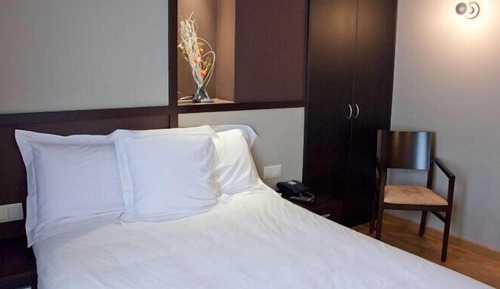 Double Room (2 adultos + 1 niño)