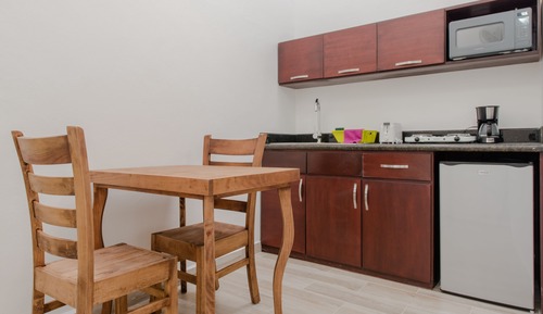 Standard Studio Suite, 1 King Bed, Kitchenette, Pool View