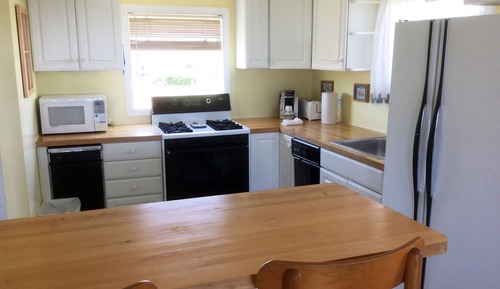Deluxe Room  Kitchenette / Private Balcony 2 Queen Beds & 1 Sofa Bed  