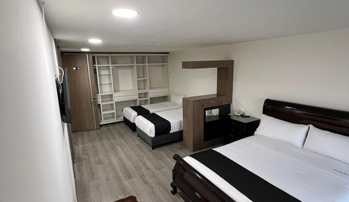 Deluxe Quadruple Room, City View