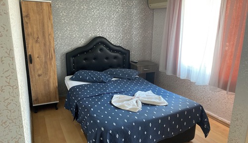 Economy Quadruple Room, City View