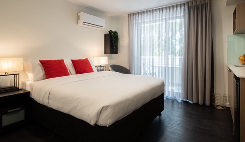 Deluxe Studio, 1 Queen Bed, Kitchenette & Balcony