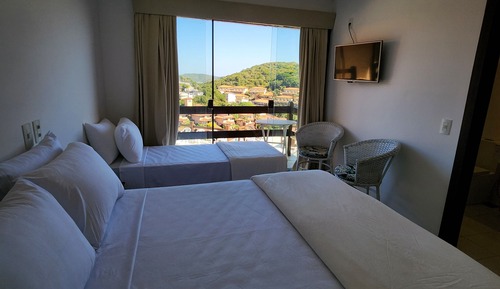 Standard Quadruple Room, Multiple Beds, Patio, Sea View