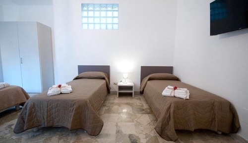 Deluxe Quadruple Room, Multiple Beds, Patio