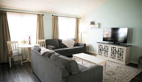 1 King Bed (Private Bedroom), 2 Queen Size Pullout Sofas