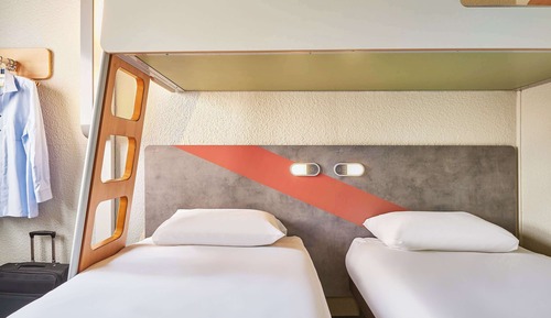 Triple Room (with 2 single beds and a bunk bed)