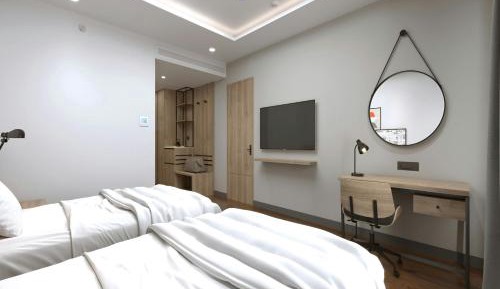 Deluxe Twin Room with Balcony and City View