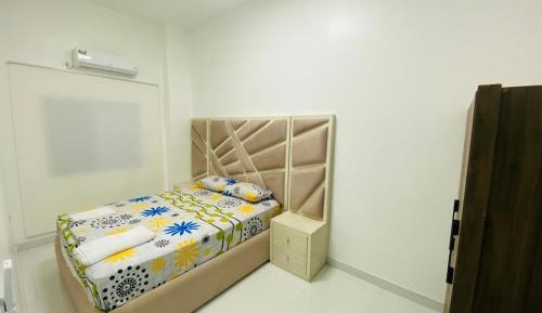 Two-Bedroom Apartment with Partial Ocean View