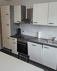 Three-Bedroom Apartment with Balcony