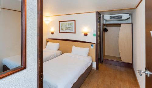 2 Single Beds with One Junior Bed