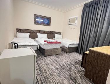 Quadruple Room with Private Bathroom