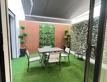 Deluxe One-Bedroom Apartment with Garden View